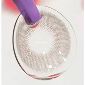 LensTown Romantea London Gray — contact lens held with tweezers