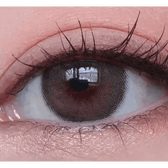 LensTown Romantea Rose Nude Brown Toric — single-eye close-up showing the contact lens appearance