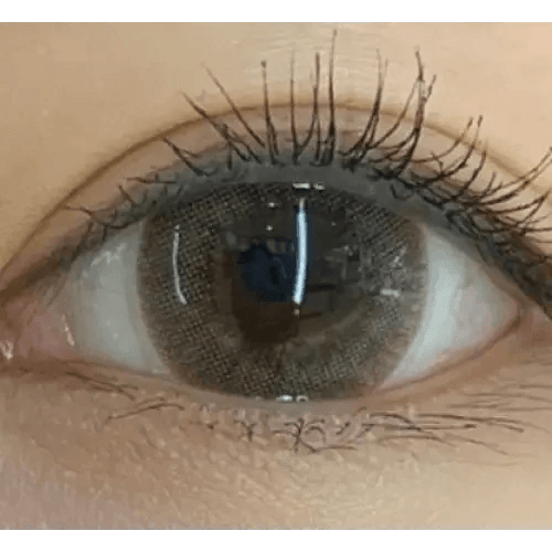 Olens Romantico 3 Color Gray — single-eye close-up showing the contact lens appearance