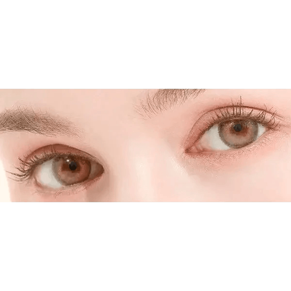LensTown Rose Swan Brown Topaz — both eyes wearing the contact lenses