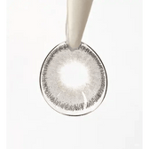 LensTown Rose Swan Gray Diamond — contact lens held with an applicator
