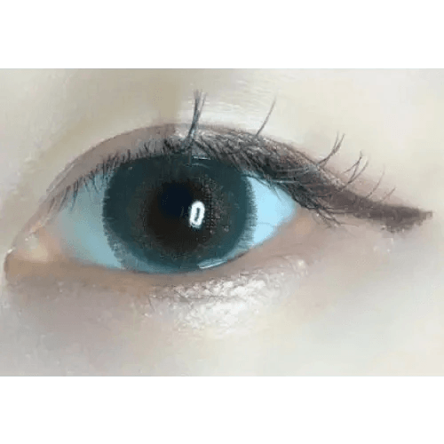 LensTown Rose Swan Green Emerald — single-eye close-up showing the contact lens appearance