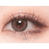 i-DOL Roze Airy Nude Brown — single-eye close-up showing the contact lens appearance